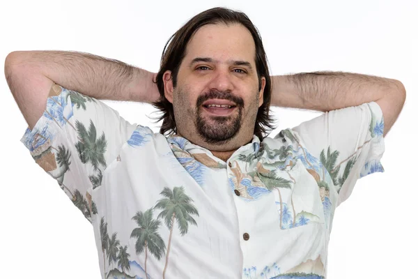 Happy fat Caucasian man smiling with arms raised on head — Stock Photo, Image