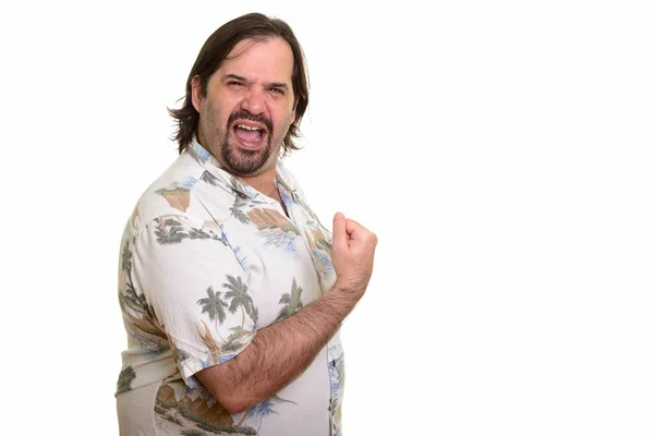 Happy fat Caucasian man smiling and looking motivated with arm r — Stock Photo, Image