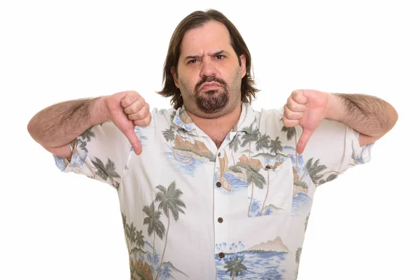 Serious fat Caucasian tourist man giving thumbs down — Stock Photo, Image