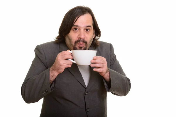 Porträt eines dicken kaukasischen Geschäftsmannes, der heißen Kaffee trinkt — Stockfoto