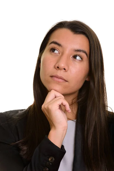 Joven mujer de negocios caucásica pensando y mirando hacia arriba — Foto de Stock