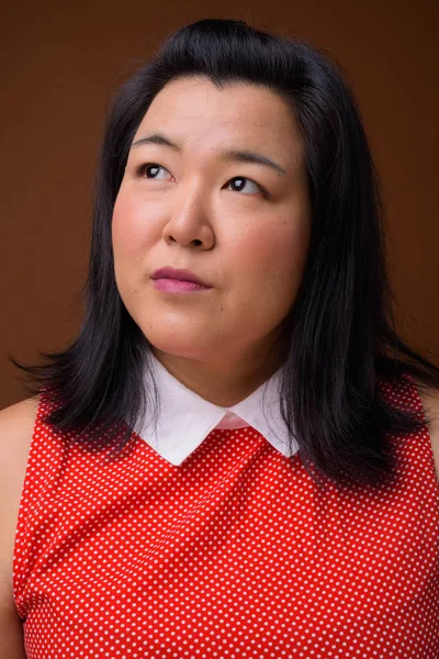 Face of beautiful overweight Asian woman thinking — Stock Photo, Image