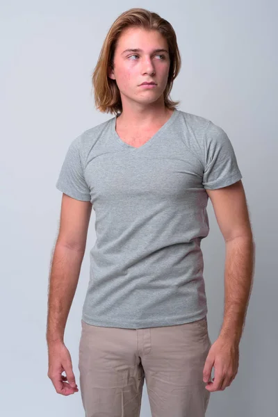 Young handsome man with long blond hair — Stock Photo, Image