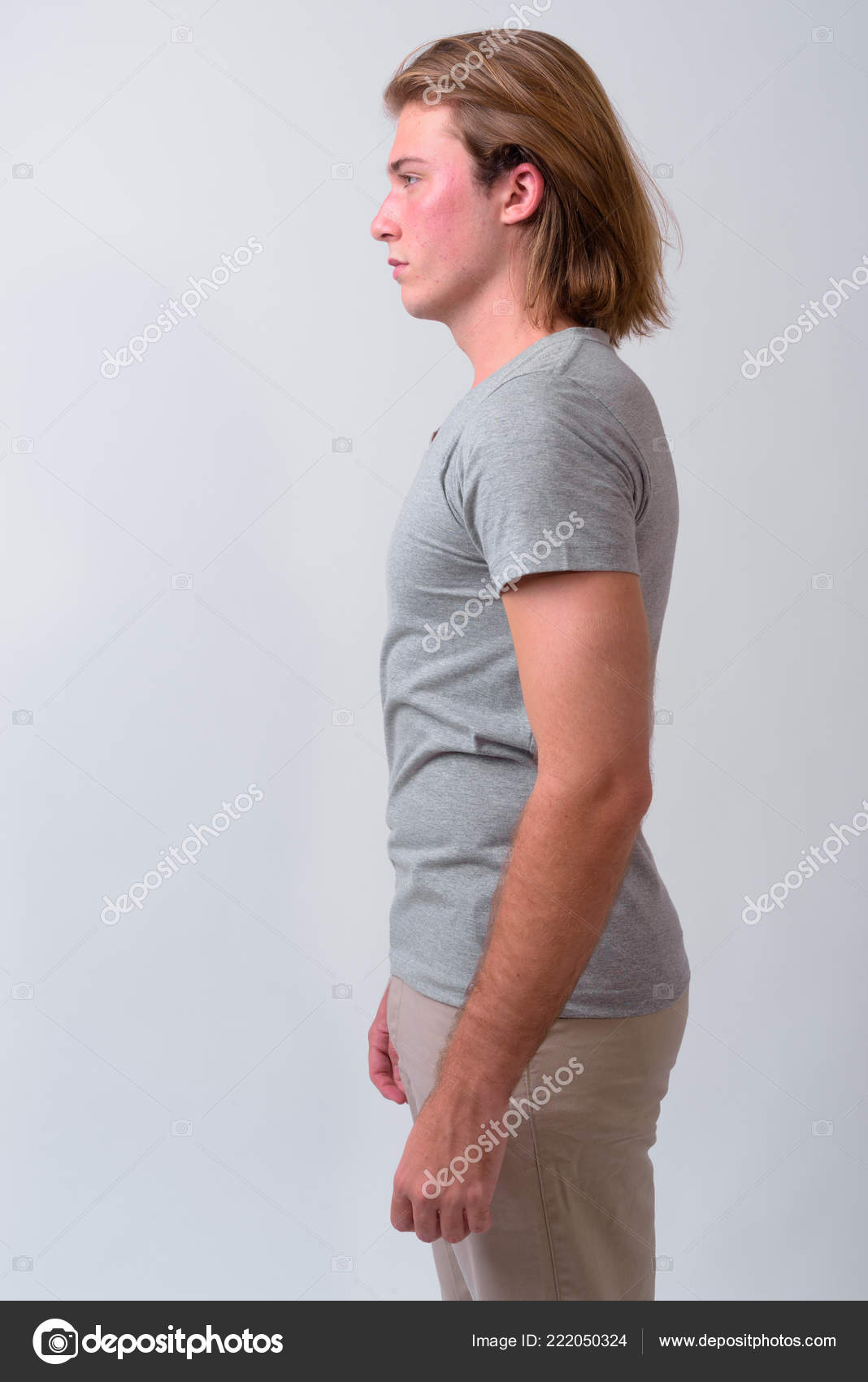 Young Handsome Man With Long Blond Hair Stock Photo