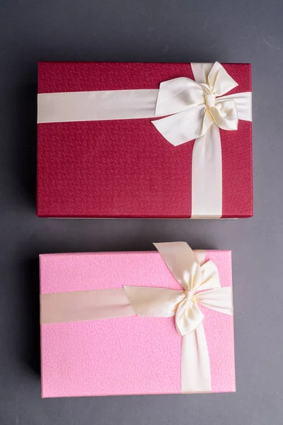 Studio Shot Of Two Gift Boxes Against Gray Background — Stock Photo, Image