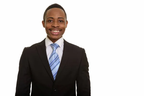 Young happy African businessman smiling isolated against white background — Stock Photo, Image