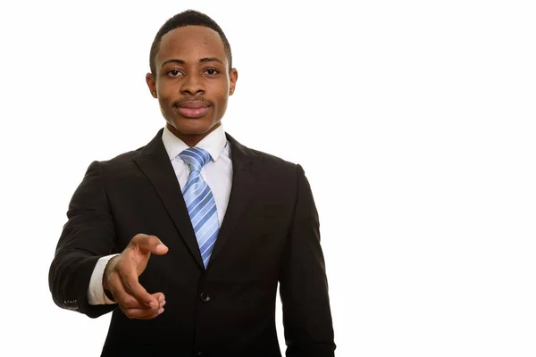 Retrato de jovem bonito empresário africano dando aperto de mão — Fotografia de Stock