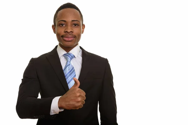 Молодий привабливий африканський бізнесмен підносить пальцем вгору. — стокове фото