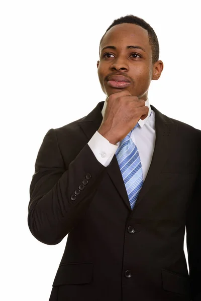 Jovem e bonito empresário africano pensando e planejando — Fotografia de Stock