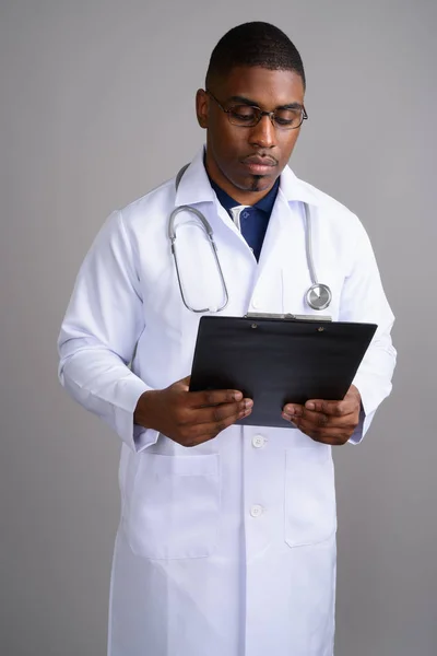 Studio Shot Young Handsome African Man Doctor Gray Background — Stock Photo, Image