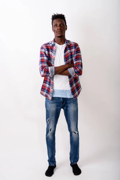 Full body shot of young black African man standing with arms cro — Stock Photo, Image