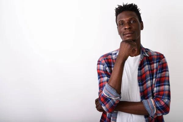 Estúdio tiro de jovem negro Africano homem pensando contra branco ba — Fotografia de Stock