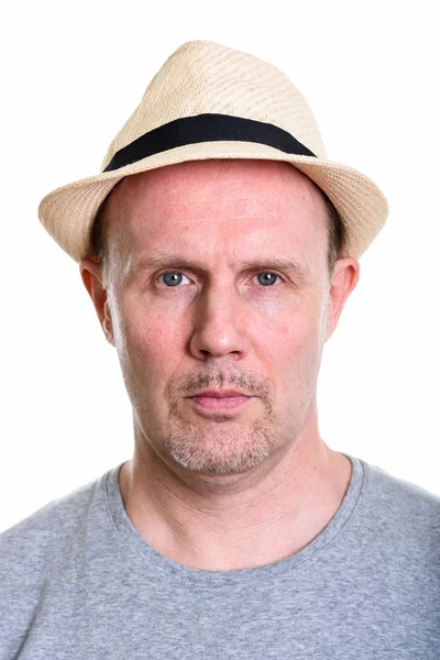Studio shot of face of mature man wearing hat — Stock Photo, Image