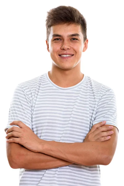 Estudio de disparo de joven feliz hombre sonriendo con los brazos cruzados — Foto de Stock