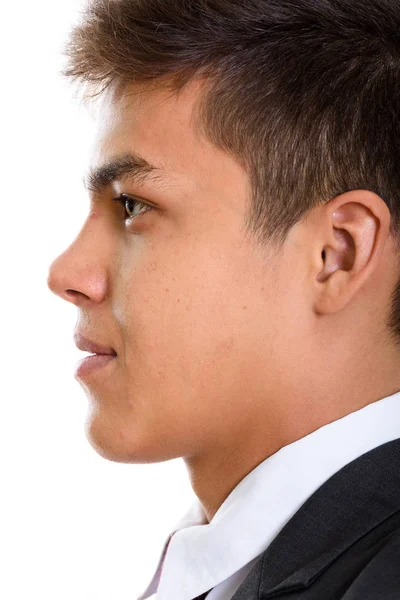 Profil-Ansicht des Gesichts des jungen hübschen Geschäftsmannes — Stockfoto