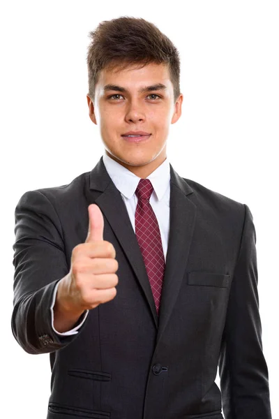 Studio shot of young handsome businessman giving thumb up — Stock Photo, Image