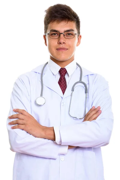 Estúdio tiro de jovem bonito homem médico com braços cruzados — Fotografia de Stock