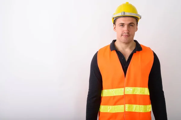 Portrait de jeune homme travailleur de la construction debout — Photo