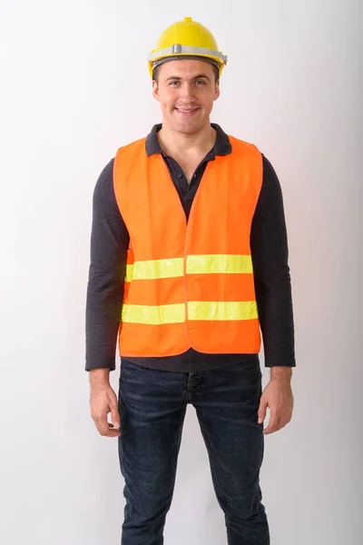 Genç adam inşaat işçisi ayakta portresi — Stok fotoğraf