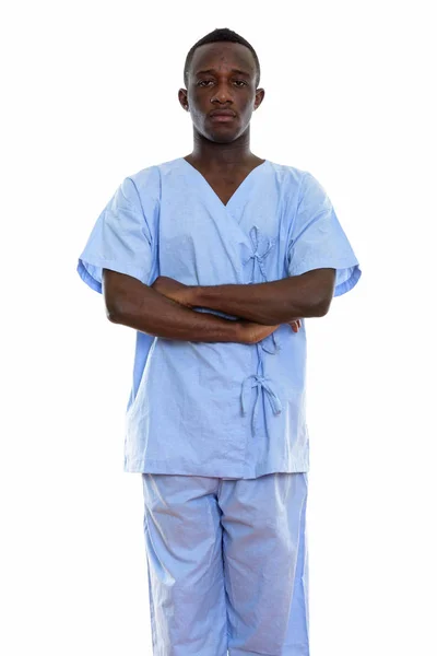 Estudio de un joven negro africano paciente de pie con el brazo —  Fotos de Stock