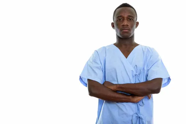 Estudio de un joven negro africano paciente con los brazos cruzados —  Fotos de Stock