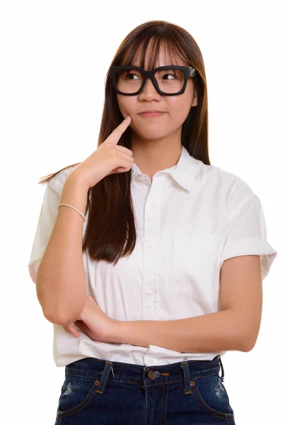 Portret van jonge leuke Aziatische tiener meisje denken — Stockfoto