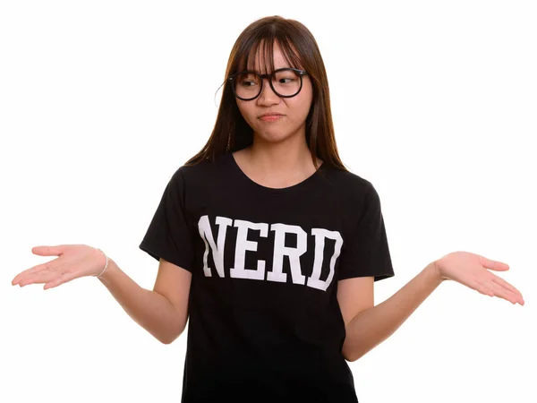 Jong schattig aziatisch nerd tiener meisje shrugging schouders — Stockfoto