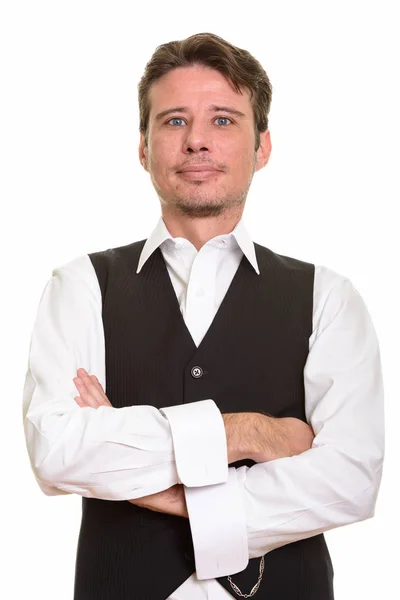 Knappe formele blanke man dragen vest met armen gekruist — Stockfoto
