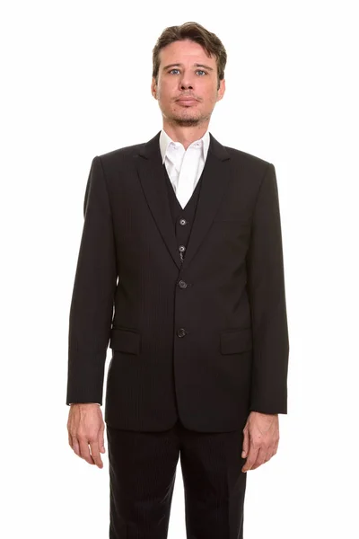 Schöner kaukasischer Geschäftsmann trägt Anzug und schaut in die Kamera — Stockfoto