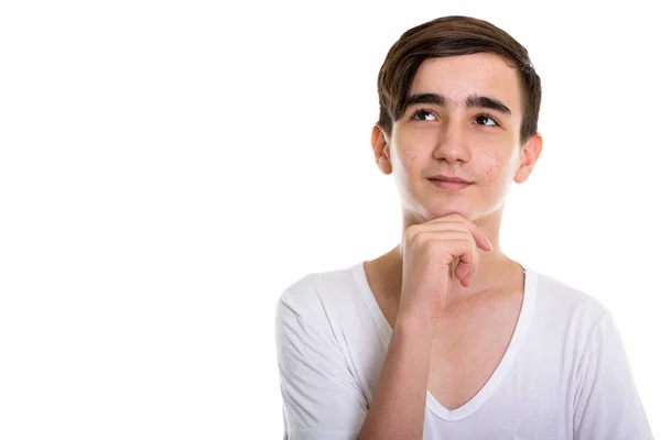 Stüdyo çekim Genç yakışıklı İranlı genç çocuk ile düşünme 