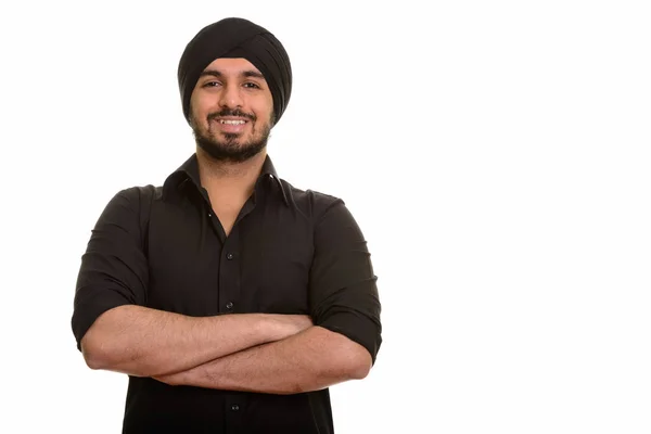 Portret młodego człowieka Indian Sikh szczęśliwy uśmiechający się — Zdjęcie stockowe
