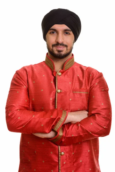 Joven y guapo Sikh indio usando ropa tradicional — Foto de Stock