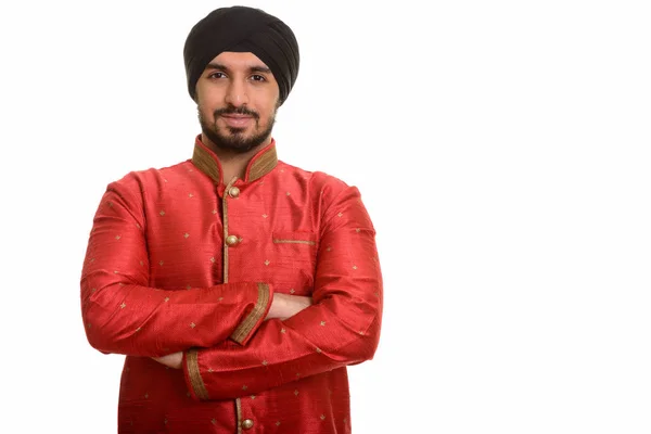 Joven y guapo Sikh indio usando ropa tradicional —  Fotos de Stock