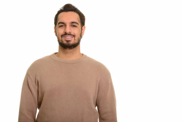 Joven hombre indio feliz sonriendo y mirando a la cámara — Foto de Stock