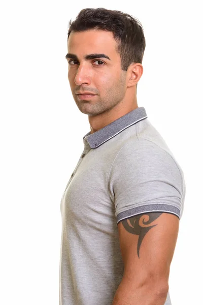 Portrait of young handsome Persian man against white background — Stock Photo, Image