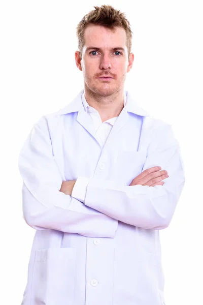 Studio shot of man doctor with arms crossed — Stock Photo, Image