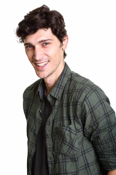 Estudio disparo de joven feliz guapo hombre sonriendo — Foto de Stock