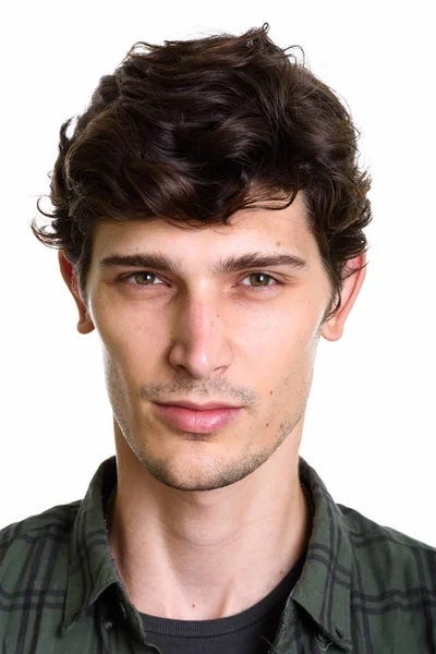 Face of young handsome Hispanic man looking at camera — Stock Photo, Image