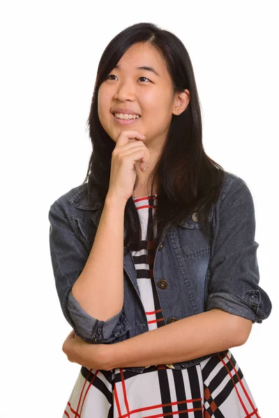 年轻快乐的亚洲女人思考和仰视 — 图库照片
