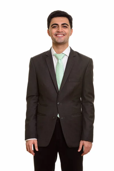 Junger glücklicher persischer Geschäftsmann blickt in die Kamera — Stockfoto