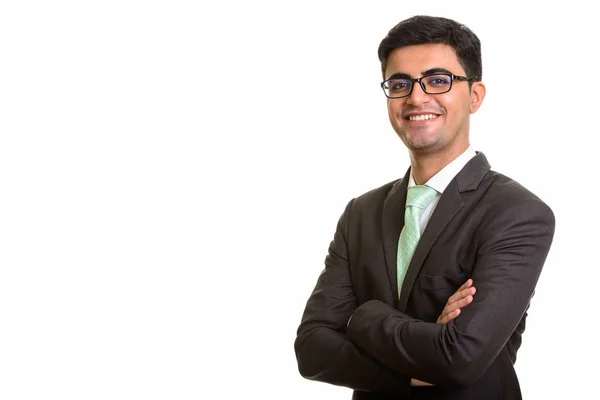 Fiatal boldog perzsa üzletember, mosolygós, keresztbe — Stock Fotó