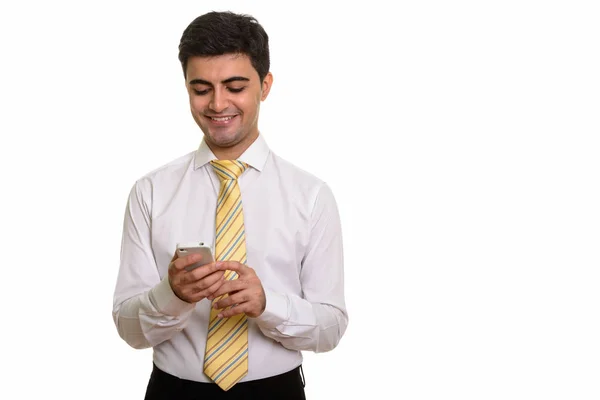 Молодой Счастливый Персидский Бизнесмен Использующий Мобильный Телефон Белом Фоне — стоковое фото