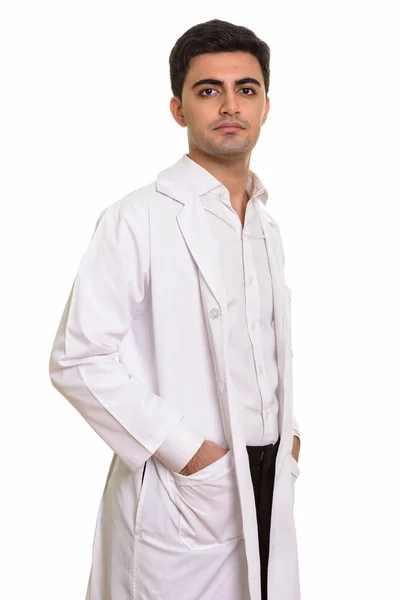 Young handsome Persian man doctor looking at camera — Stock Photo, Image