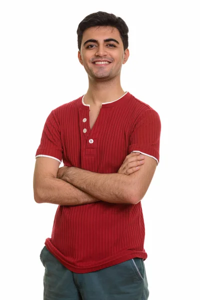 Jovem feliz persa homem sorrindo com os braços cruzados — Fotografia de Stock