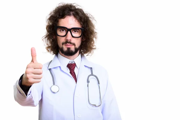 Studioshot av stilig man läkare ger tummen upp — Stockfoto