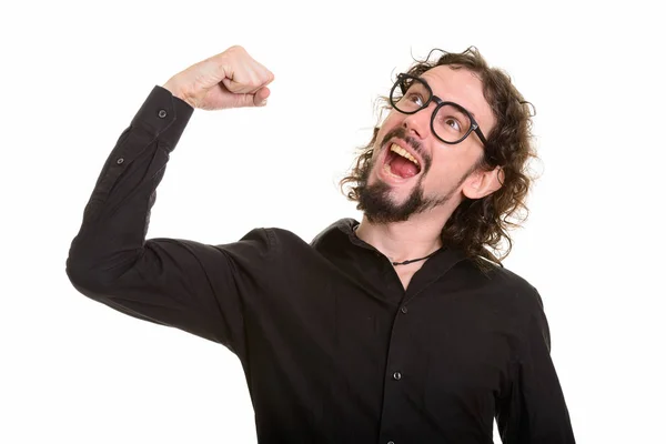 Portrait of handsome happy crazy Caucasian man flexing muscles — Stock Photo, Image