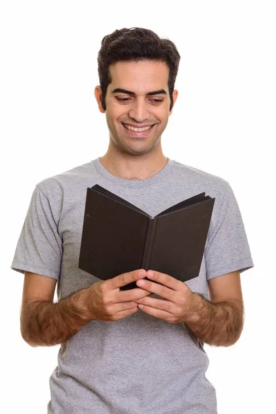 Portrait de jeune homme persan heureux livre de lecture — Photo