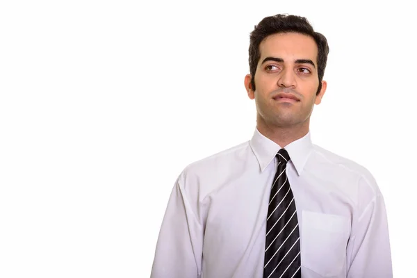 Porträt eines jungen persischen Geschäftsmannes, der denkt und plant — Stockfoto