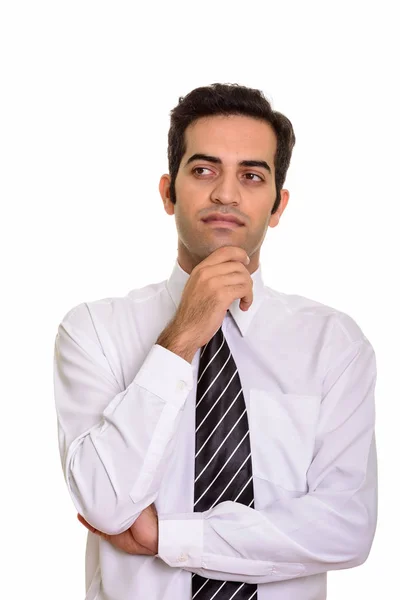 Portrait of young Persian businessman thinking and planning — Stock Photo, Image