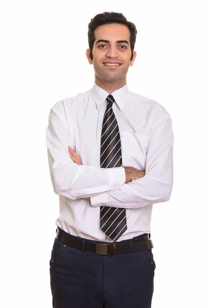Giovane felice uomo d'affari persiano sorridente con le braccia incrociate — Foto Stock